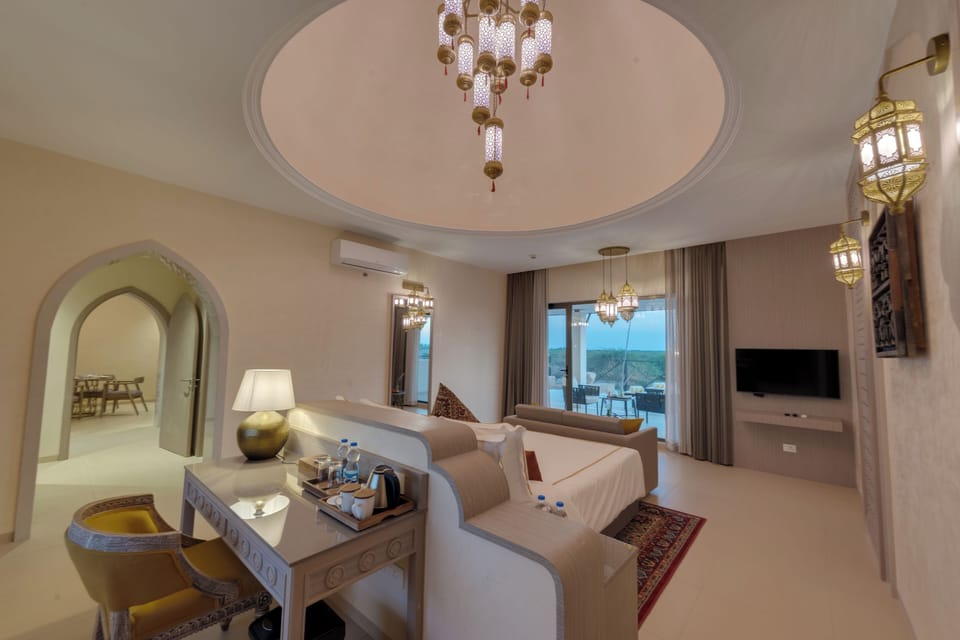 Fern Club Suite | In-room safe, desk, laptop workspace, iron/ironing board