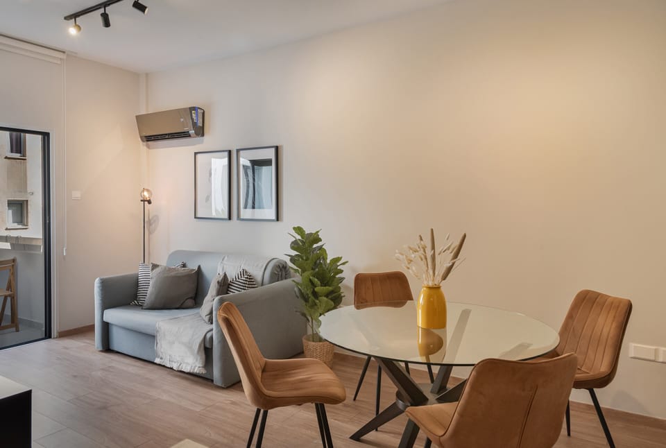 Luxury Apartment, City View | Living area | Flat-screen TV