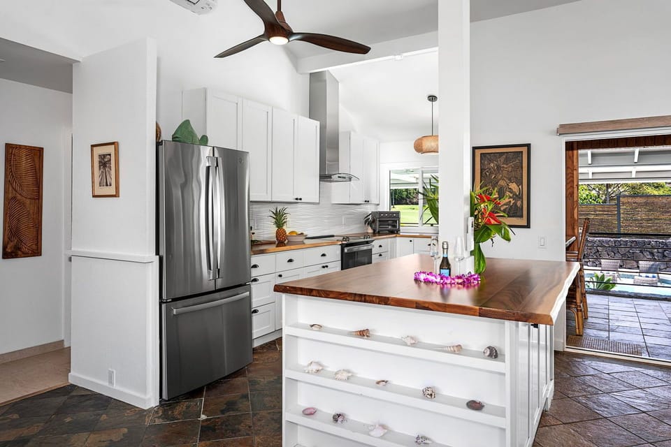 Stainless appliances and a center island give the kitchen room for real cooking.