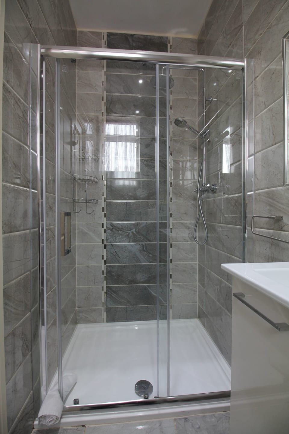 Shower, free toiletries, hair dryer, towels