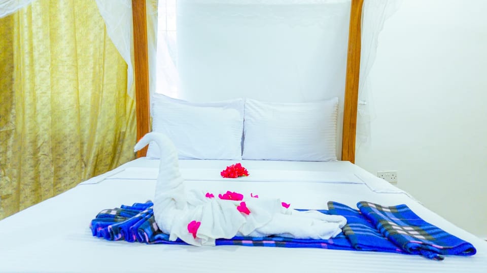 Deluxe Double Room, Balcony, Ocean View | In-room safe, iron/ironing board, bed sheets