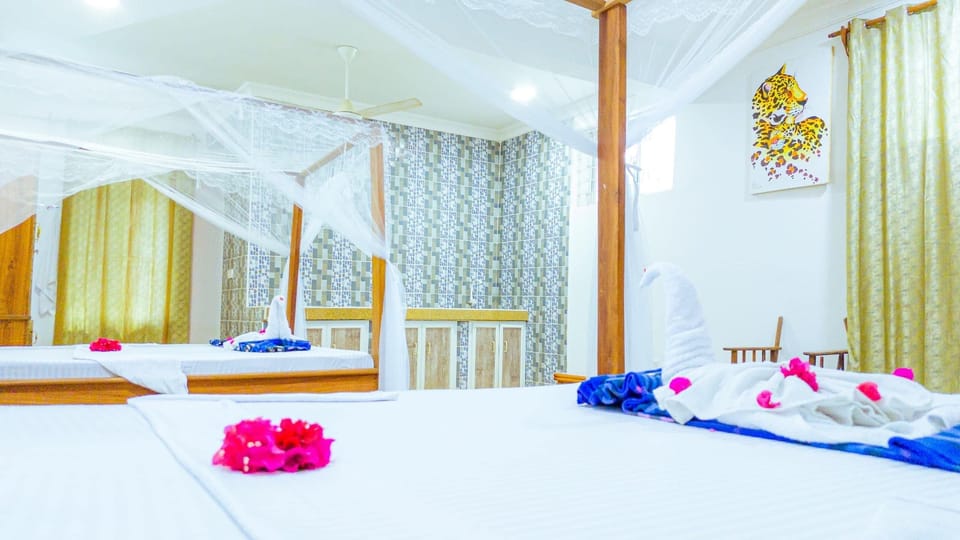 Family Suite, Balcony, Ocean View | In-room safe, iron/ironing board, bed sheets