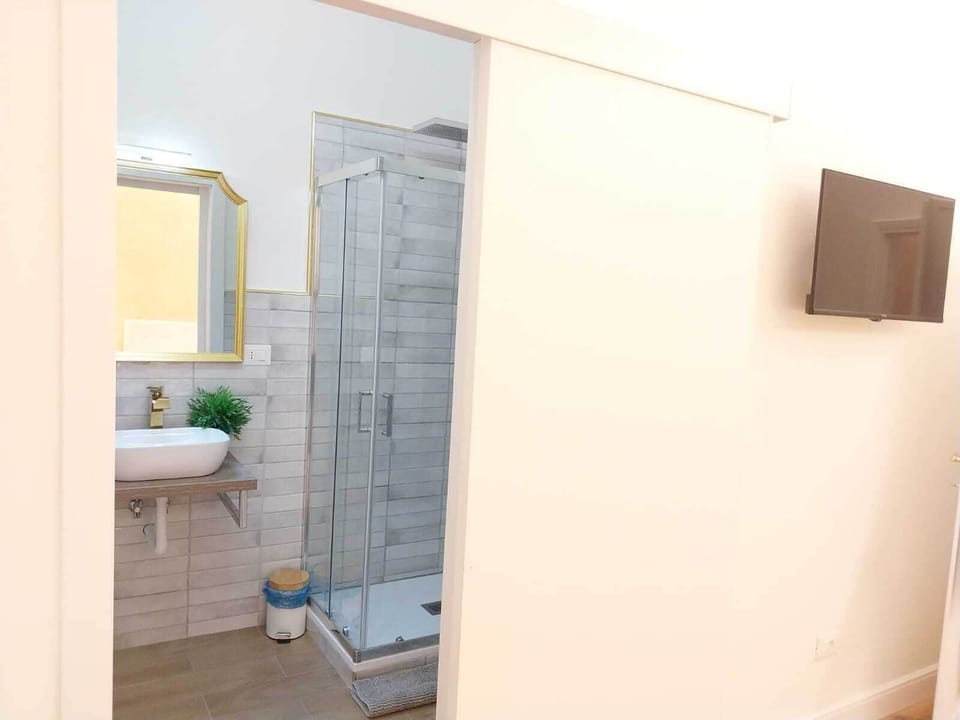 Standard Double Room, Courtyard View | Bathroom | Shower, hair dryer, towels, soap