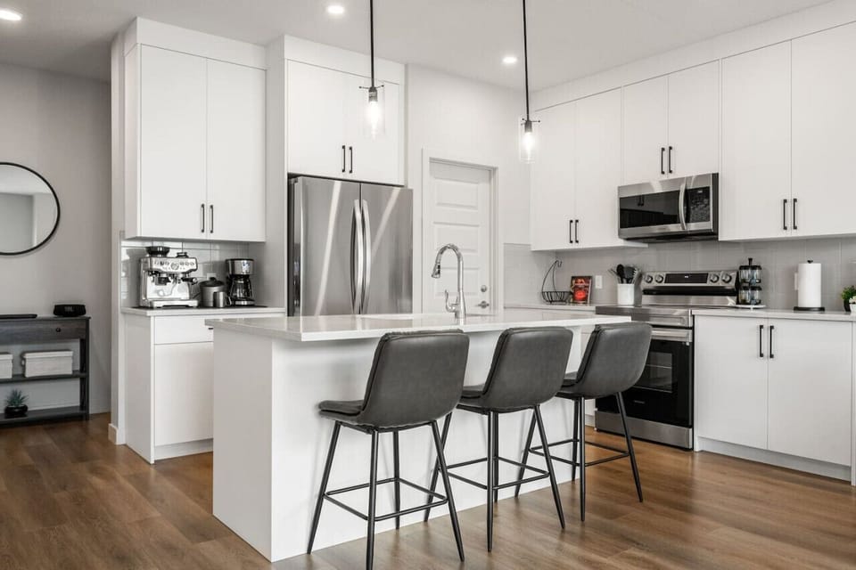 Full kitchen (main floor) with a Breville Barista espresso machine, blender, rice cooker, slow cooker/crockpot & more.