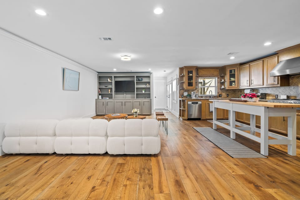 Spacious open concept Living Room with Full Kitchen 