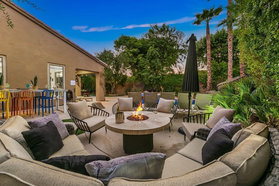 Gather around our cozy fire table with seating for 10. Perfect for relaxing under the stars, roasting marshmallows, or enjoying a drink, this inviting spot is ideal for warm, memorable evenings.