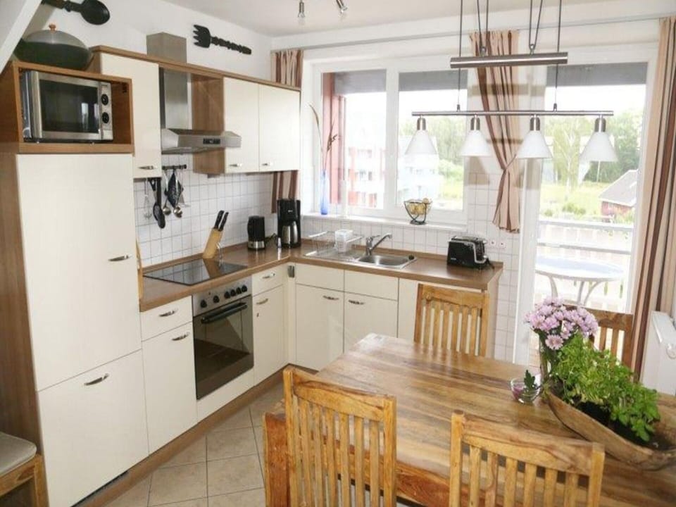 Apartment | Private kitchen | Electric kettle, toaster, highchair