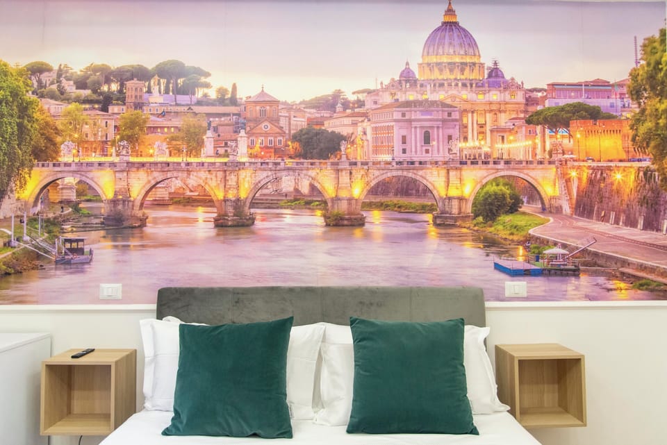 Room San Pietro, queen bed, AC/Heat, non-smoking, private bathroom | Desk, laptop workspace, blackout drapes, iron/ironing board