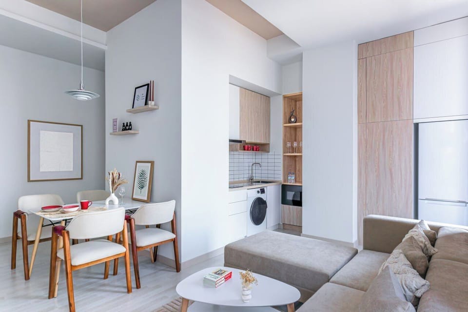 Apartment, City View | Living area | Flat-screen TV