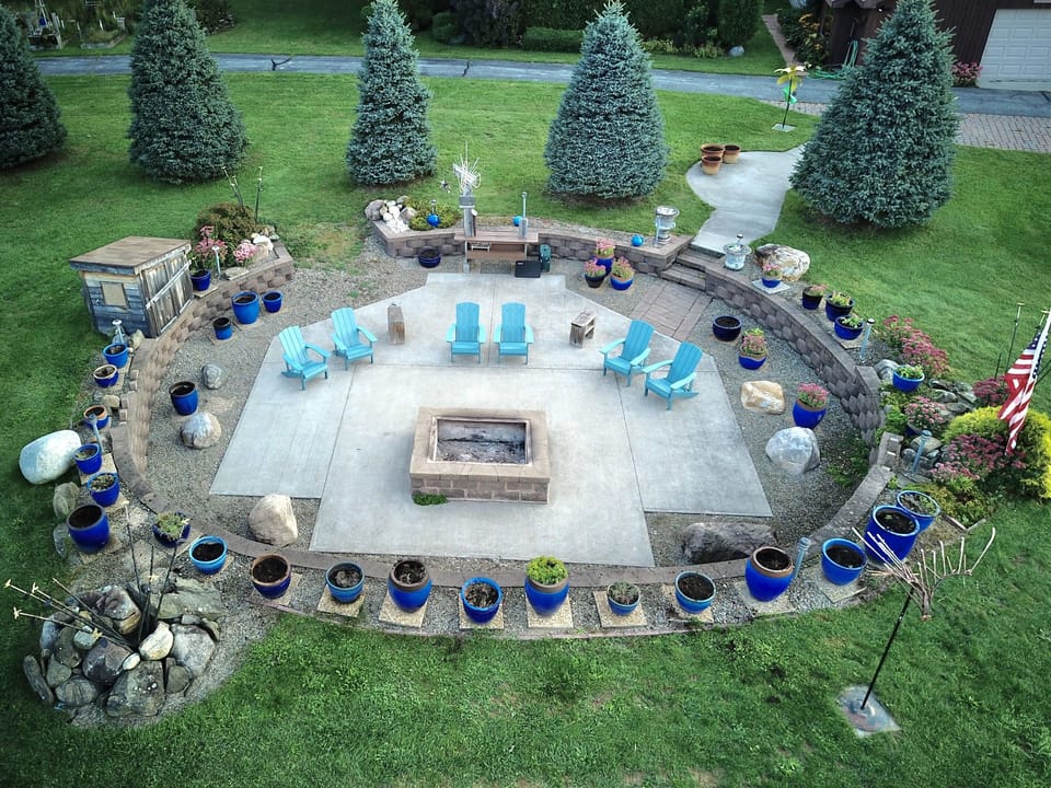 Our firepit area is a dream come true for those seeking the perfect spot to gather with family and friends over cup of cocoa or hot toddy!  :) It has ample space to accommodate even the largest groups!