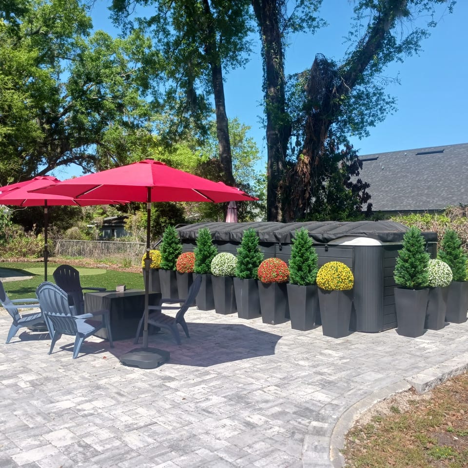 .enjoy the fire pit under lighted umbrellsa at night or dip into the swim spa.