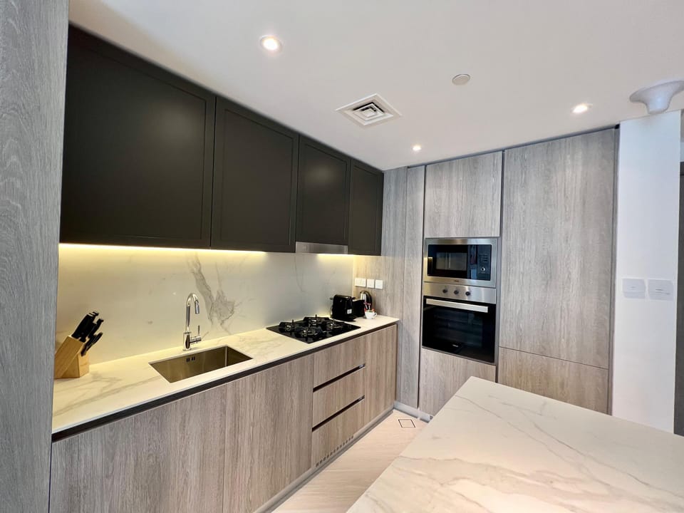 Deluxe Apartment, Balcony | Private kitchen | Fridge, microwave, oven, stovetop
