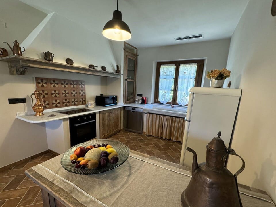 Villa | Private kitchen | Fridge, microwave, oven, dishwasher