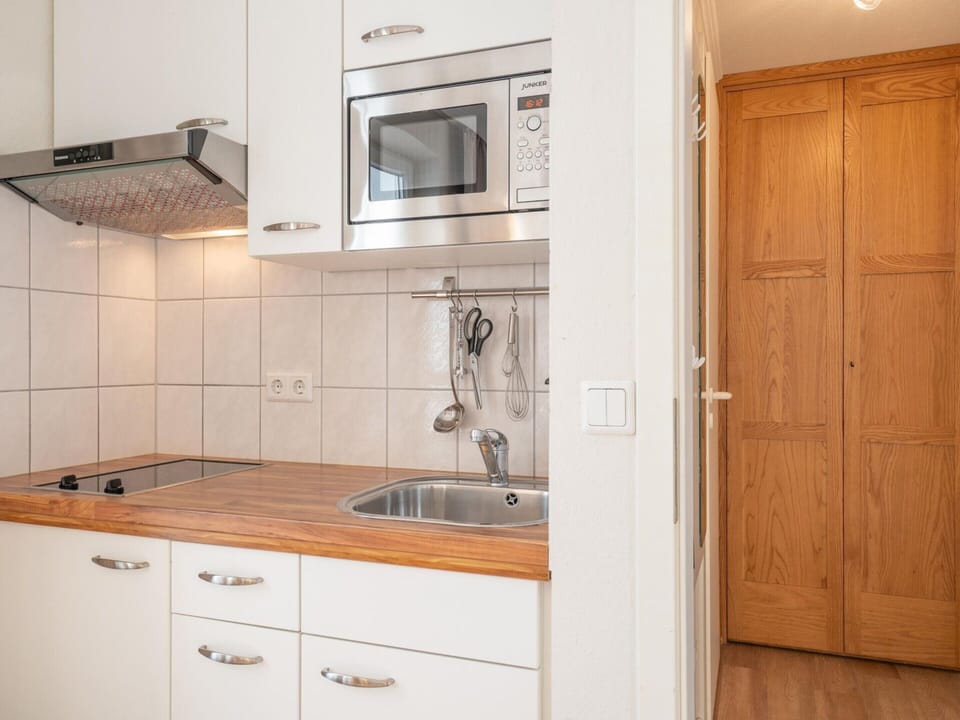 Apartment | Private kitchen | Electric kettle, toaster, highchair