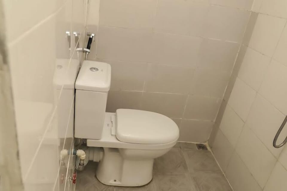 Economy Room, Balcony, City View | Bathroom | Free toiletries, hair dryer, towels, soap