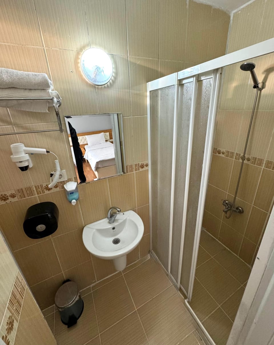 Shower, free toiletries, hair dryer, towels