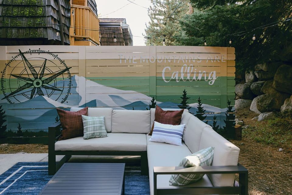 Enjoy the crisp mountain air against the backdrop of this gorgeous mural by a local artist.