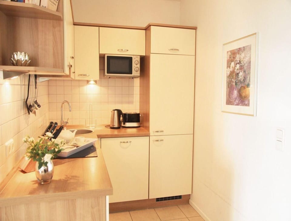 Apartment | Private kitchen | Electric kettle, toaster, highchair