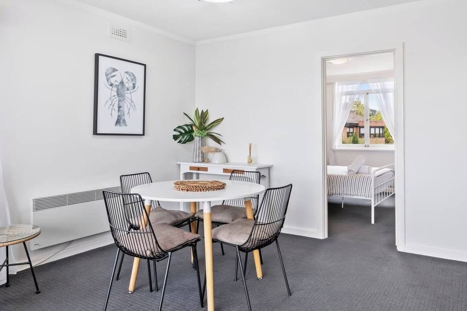 Dining at home is a breeze with a full kitchen and a four-seater table. 