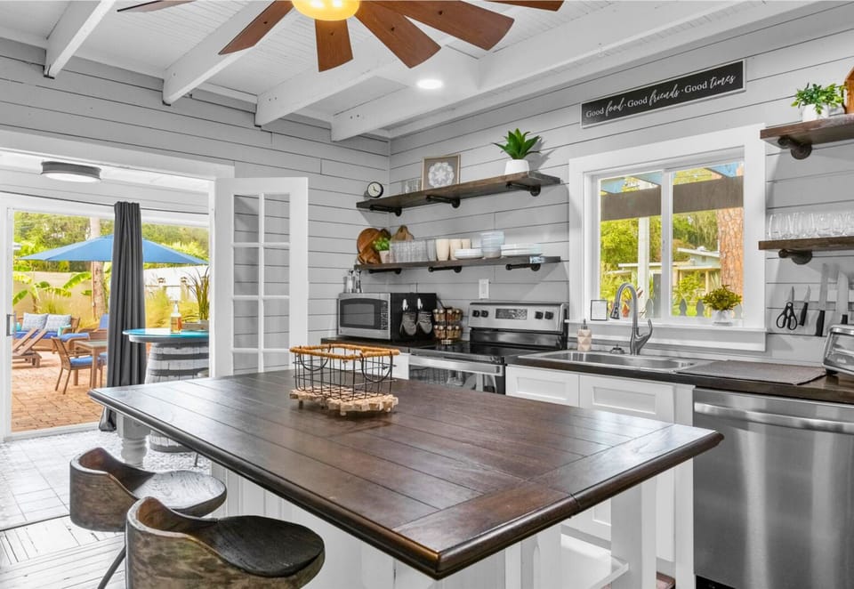 A spacious island in the heart of the kitchen invites everyone to gather