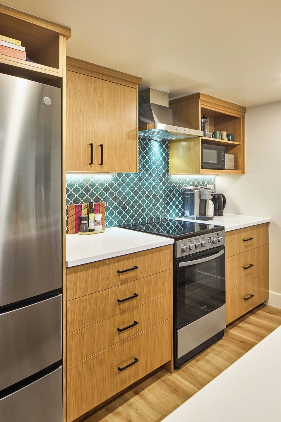 White rift oak cabinetry was made by a local craftsman.