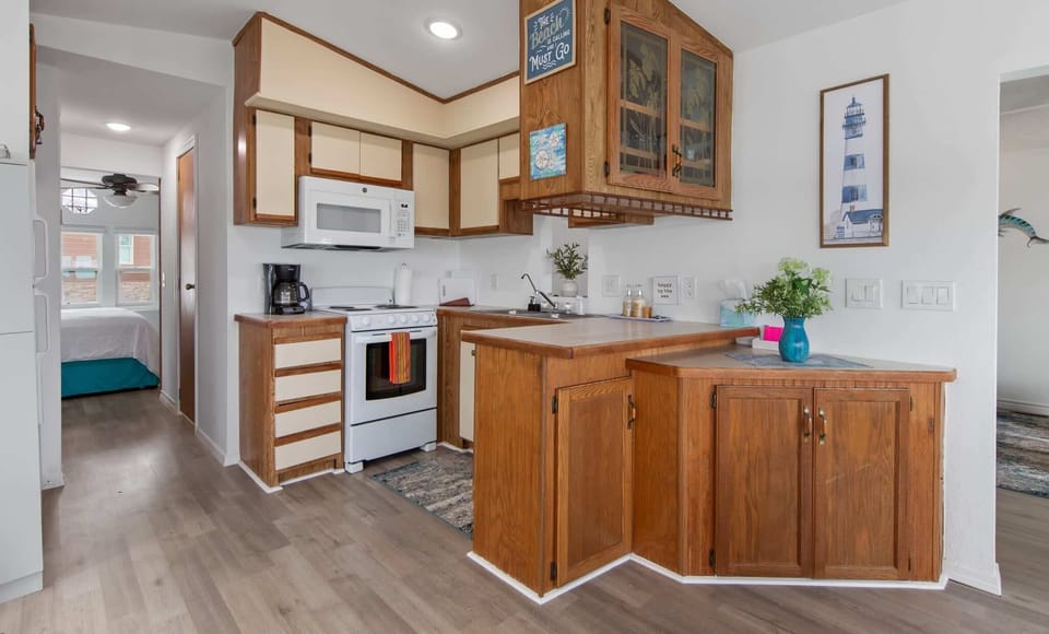 A cheerful kitchen stocked for your stay