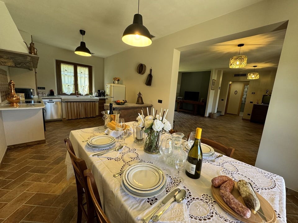 Food, Table, Tableware, Furniture, Bottle, Plate, Interior Design, Tablecloth, Chair, Dishware