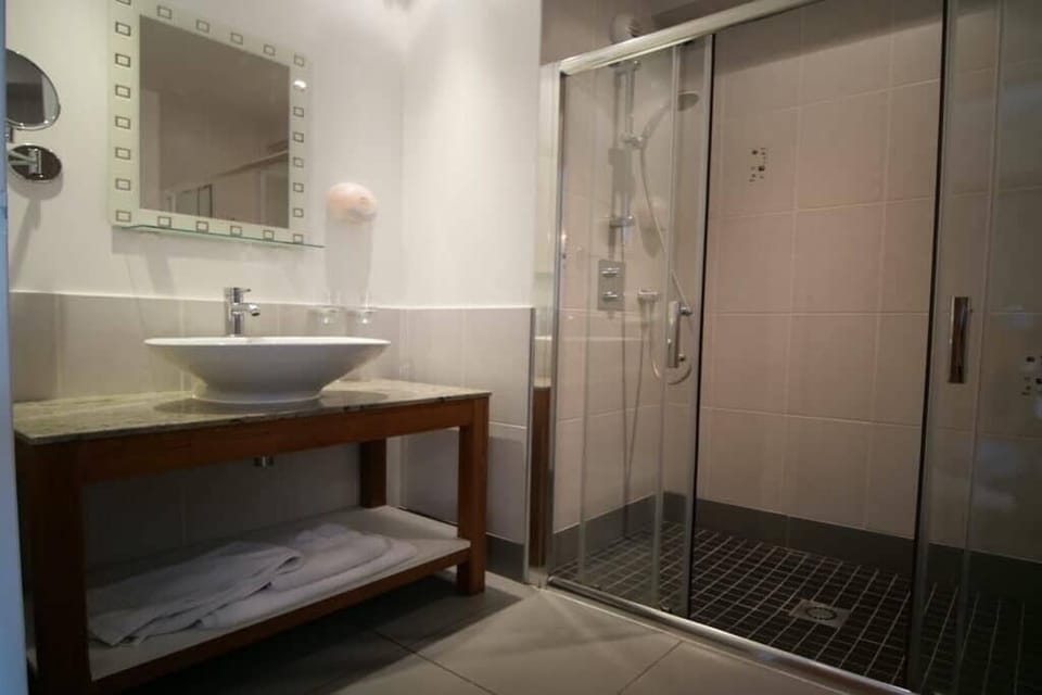 Standard Double Room, Lake View | Bathroom | Shower, hair dryer, towels, soap