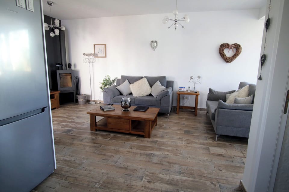 Spacious living area with comfy sofas perfect for relaxing after a day exploring