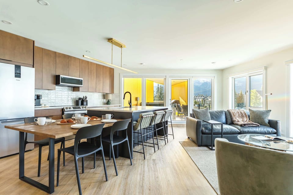 A well-appointed kitchen, a dining space for shared meals and a comfortable living room to relax and unwind.