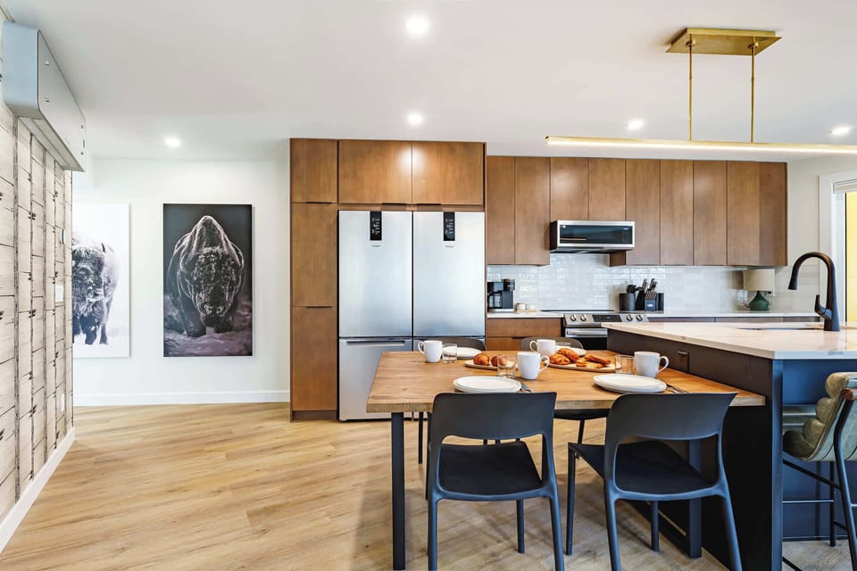 Thoughtfully designed kitchen with dedicated dining space.