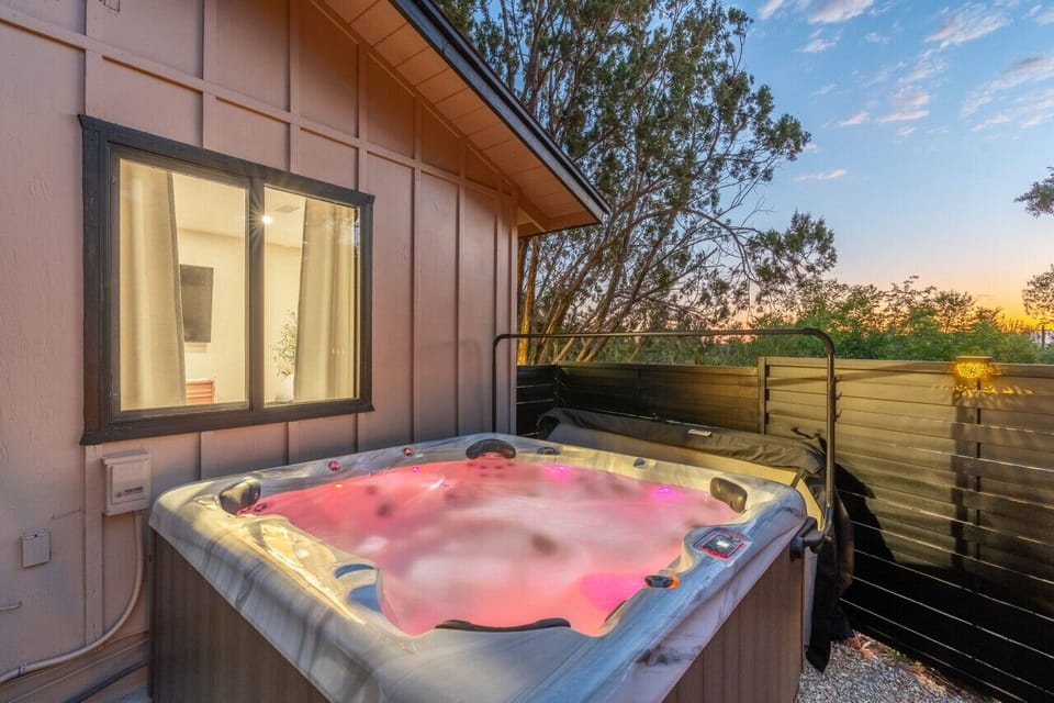 Sunset retreat: soak in your private hot tub beneath a starlit sky
