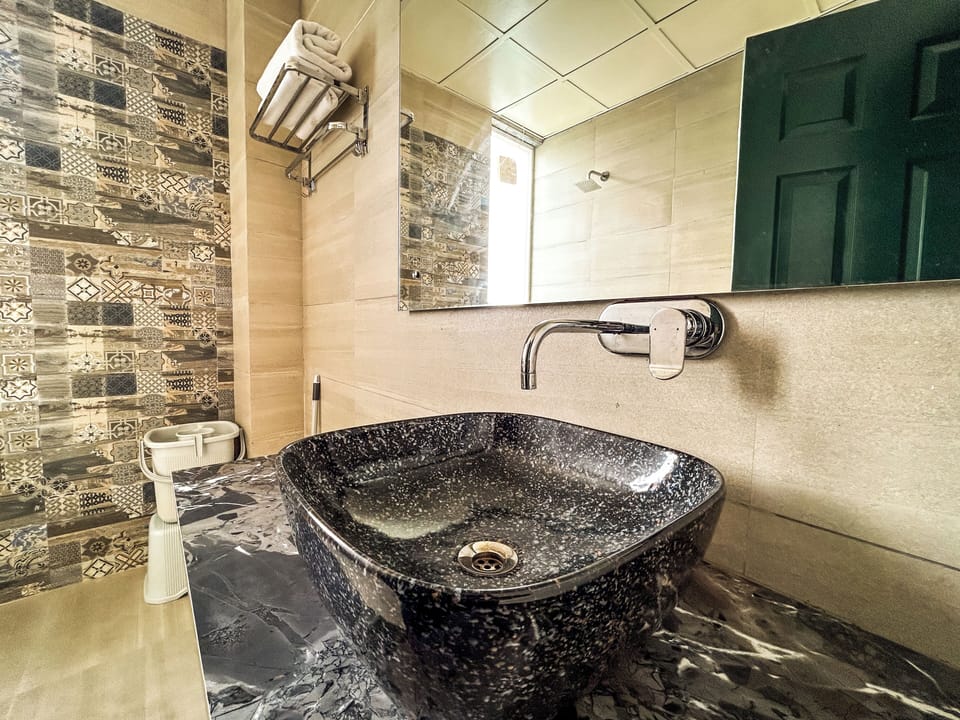 Olive - River/Mountain View with Balcony | Bathroom | Free toiletries, towels, soap, toilet paper
