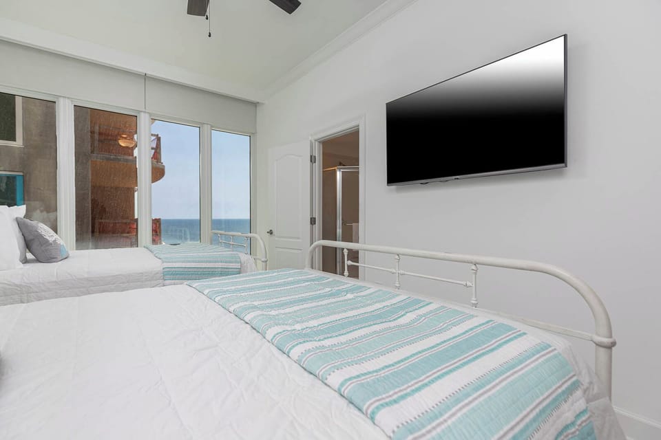 Unwind after a day at the beach with your favorite show or a movie and breathtaking beach views