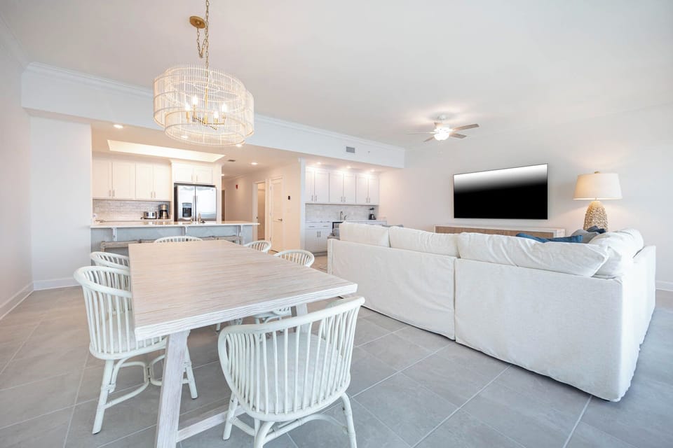 Gather in this welcoming living space and enjoy stunning beach views through the windows
