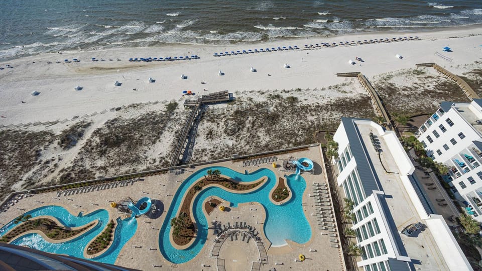 Double the fun at the pool area with two inviting lazy rivers and thrilling waterslides