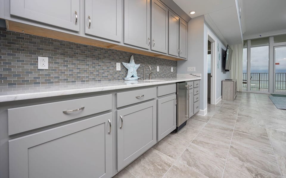 Grab a chilled drink from the fridge or create your favorite cocktail at the wet bar