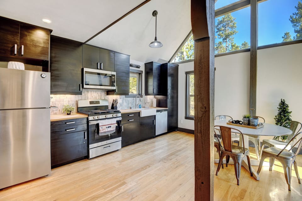 The main cabin opens up to a spacious great room with vaulted ceilings...