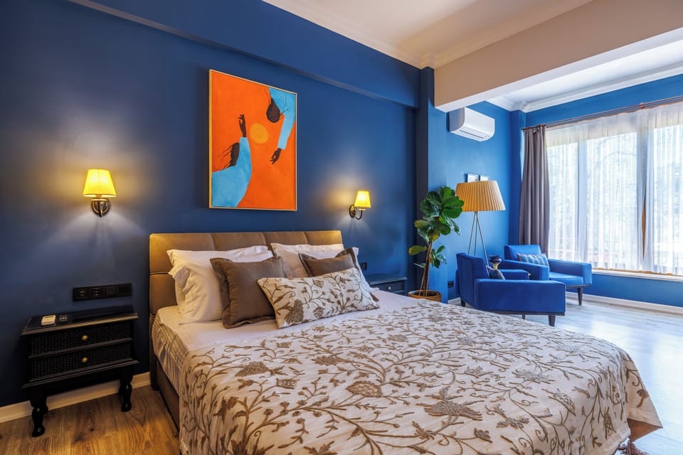 Deluxe Triple Room | Minibar, laptop workspace, free WiFi, bed sheets