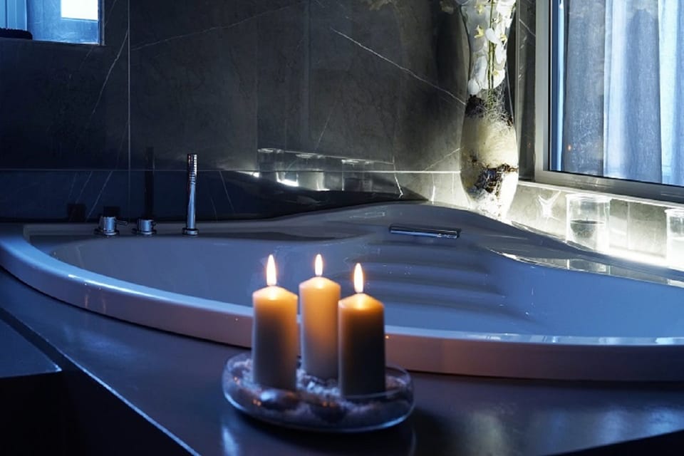 Royal Suite, 1 Queen Bed, Jetted Tub, City View | Private spa tub
