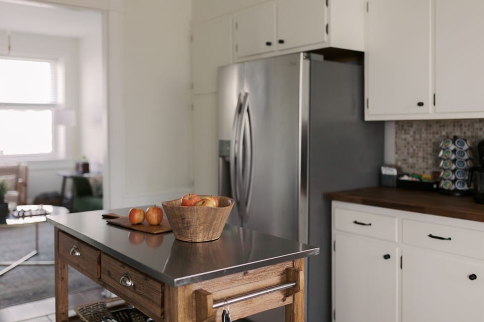 FULL KITCHEN
- Refrigerator, coffee bar, essential kitchen items
