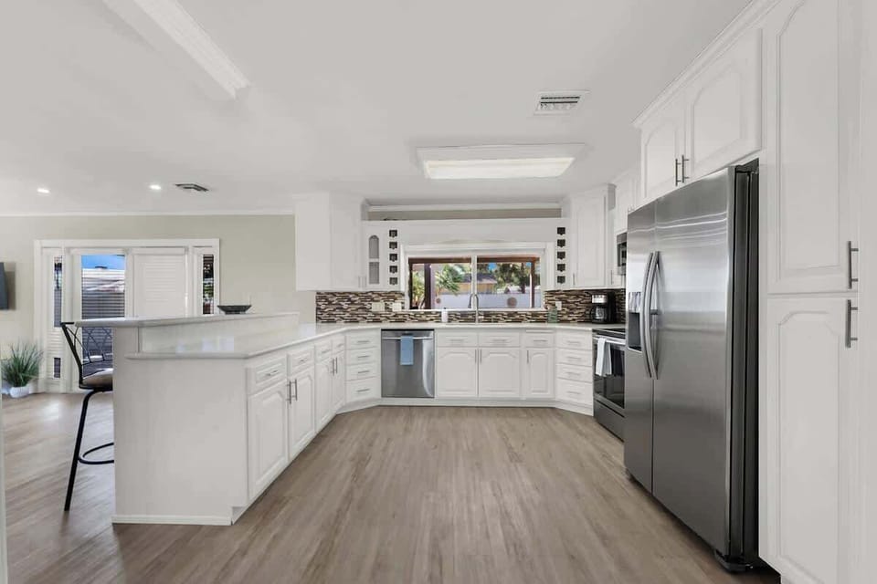 Whip up your favorite meals in the fully stocked kitchen with all the essentials and modern appliances.
