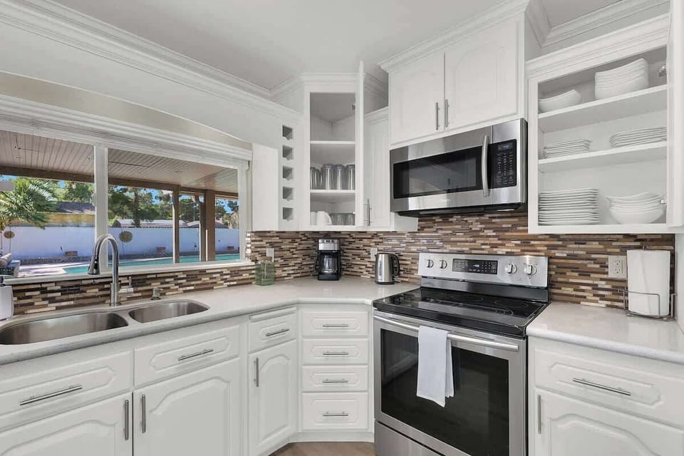 Whip up your favorite meals in the fully stocked kitchen with all the essentials and modern appliances.