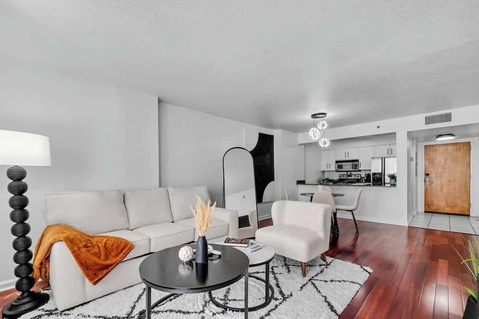 Unwind in the cozy living area, featuring a queen sofa bed and smart TV.