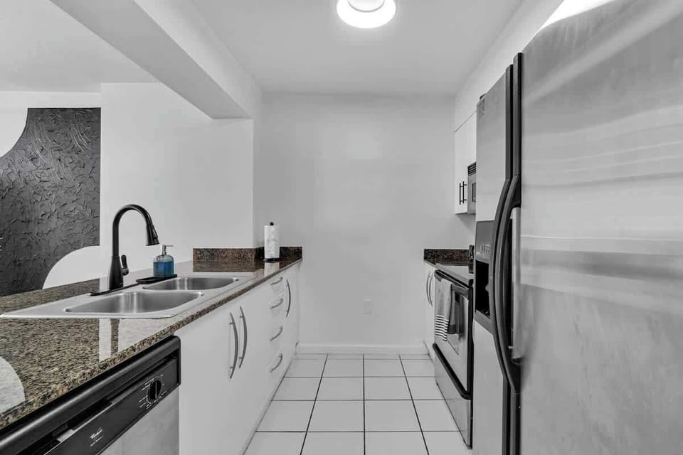 Cook like a pro in the fully stocked kitchen, complete with a dishwasher for easy cleanup.