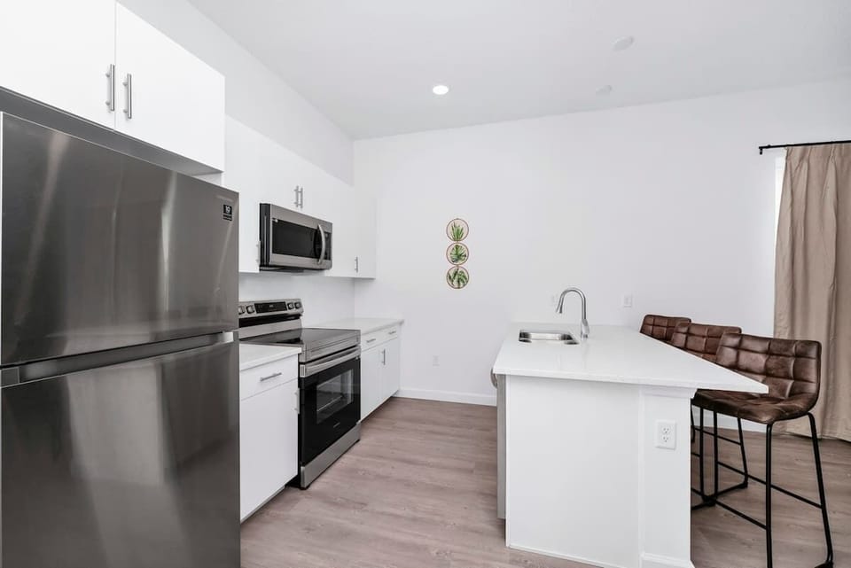 Cook with ease in a fully stocked kitchen, ready for your culinary adventures.