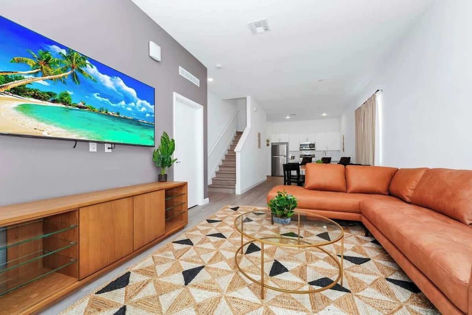 Relax in the spacious living area, perfect for family gatherings.