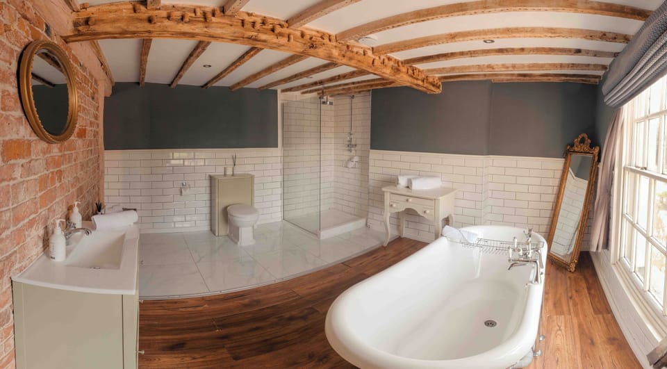 Capesthorne Suite | Bathroom | Combined shower/tub, deep soaking tub, rainfall showerhead