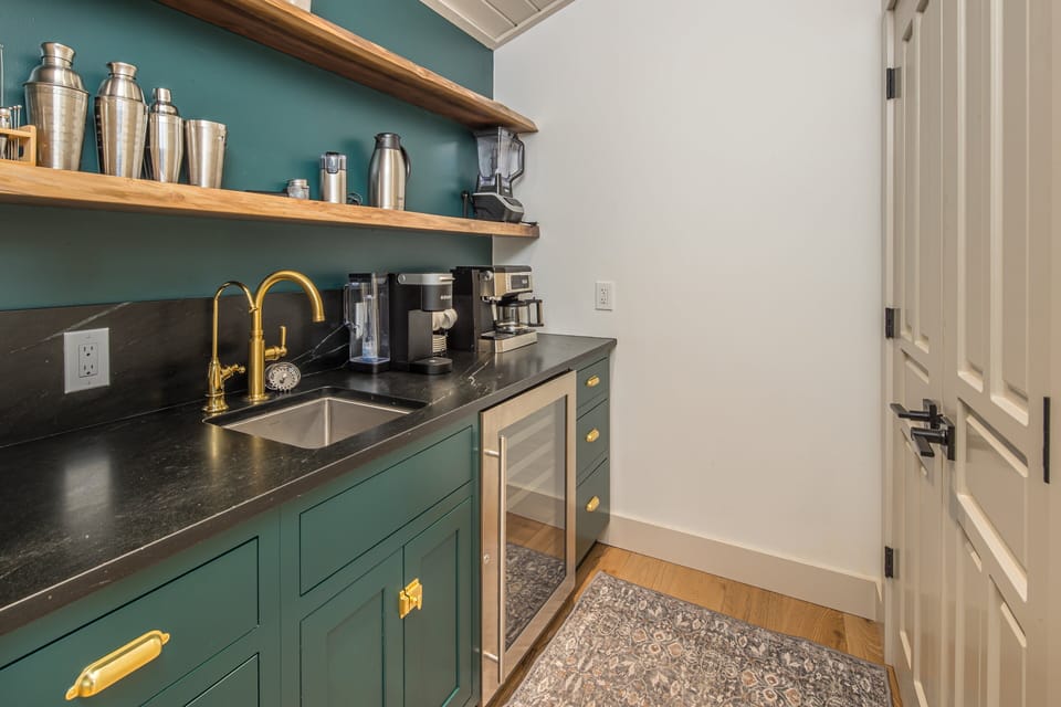 A dedicated coffee and cocktail bar stocked with everything needed to craft the perfect drink | Upper Level