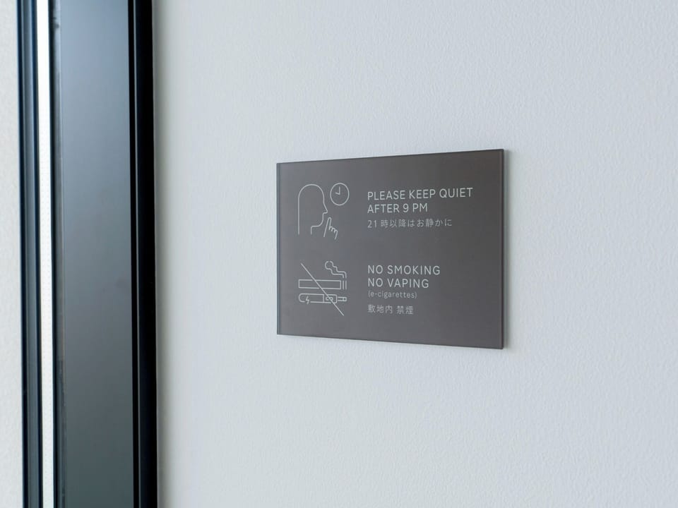 [Facility sign] No smoking inside the facility